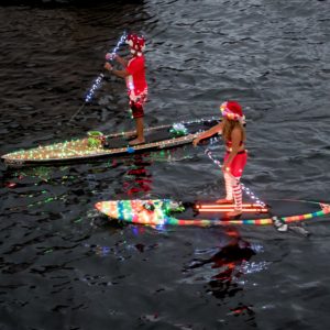 An image of a pair of Kayaks, Non-Motorized entries in the Winterfest Boat Parade