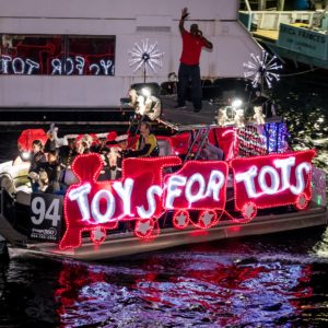 An image of a Non-Profit Boat entry in the Winterfest Boat Parade