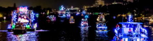 Boats at night along the Intracoastal Waterway during the Winterfest Boat Parade
