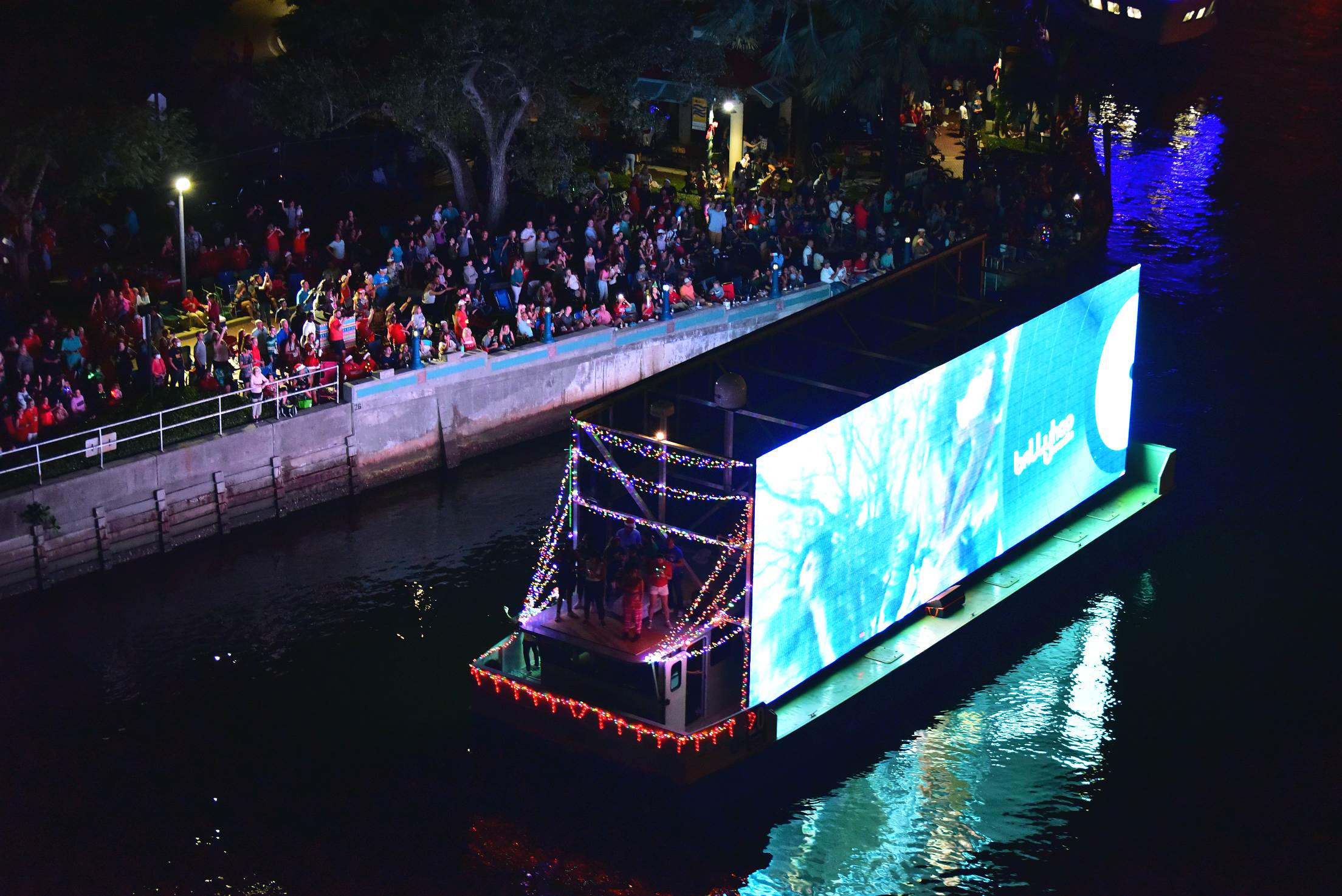 Wellington Conservation Center on board Musette, boat number 19 in the 2021 Winterfest Boat Parade