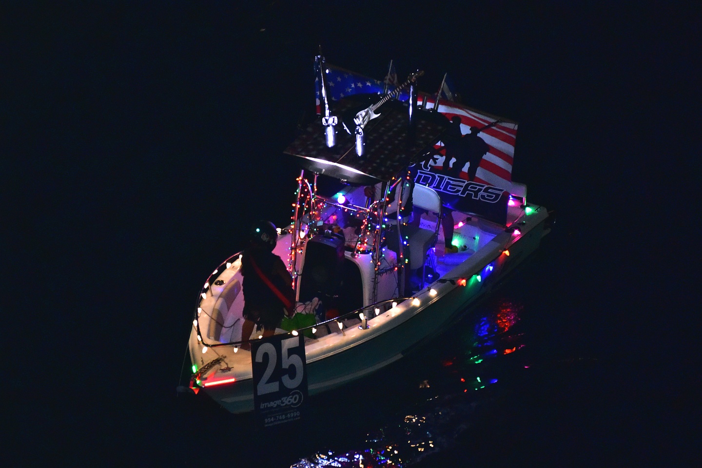 Key Largo, boat number 25 in the 2021 Winterfest Boat Parade