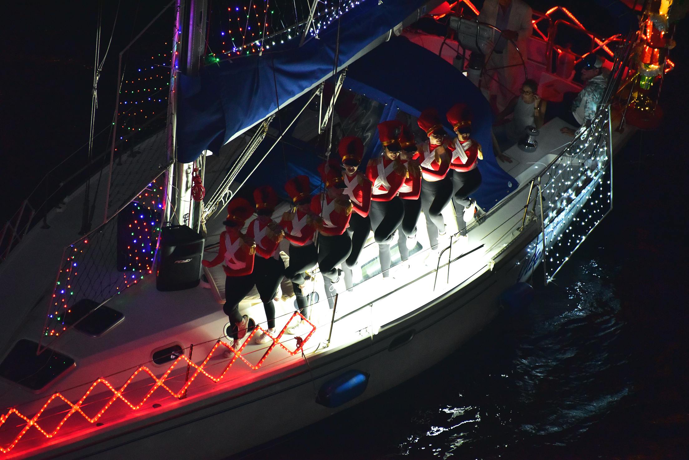 Toy Soldiers on board Otter, boat number 33 in the 2021 Winterfest Boat Parade
