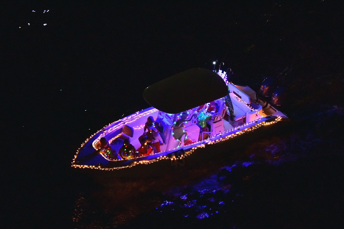 Reel Busy, boat number 43 in the 2021 Winterfest Boat Parade