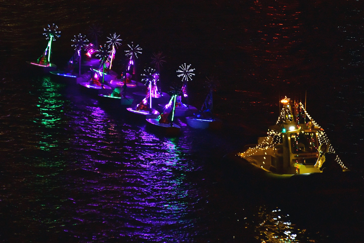 Sea Tow & The 12 Dinghies of Christmas, boat number 51 in the 2021 Winterfest Boat Parade