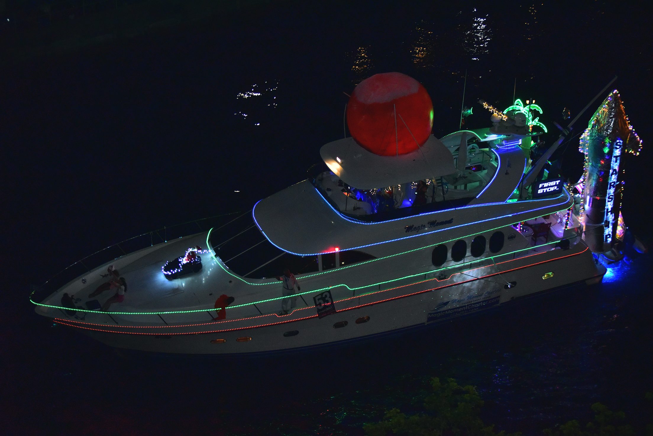 Magic Moment, boat number 53 in the 2021 Winterfest Boat Parade