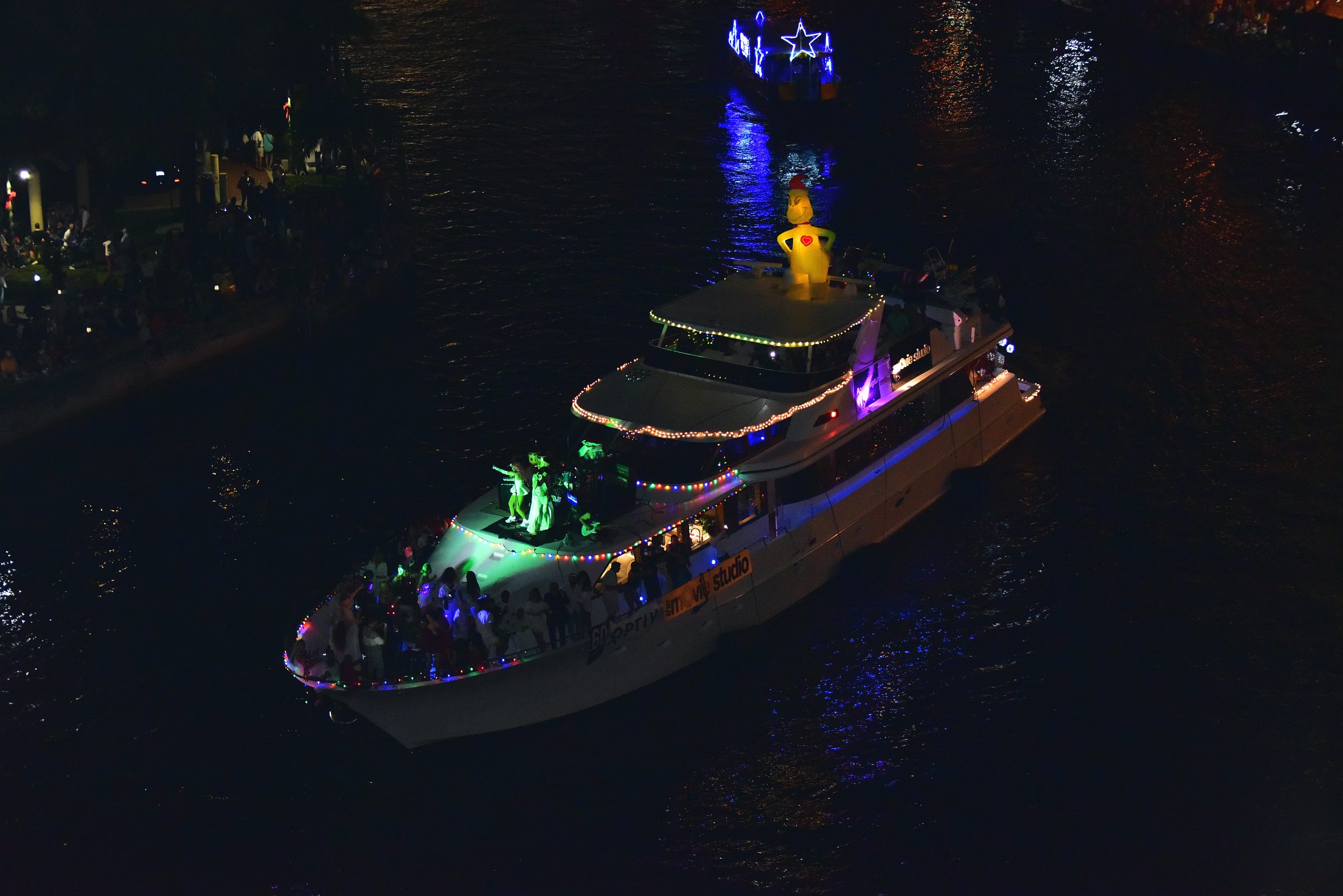 Miss Direction, boat number 60 in the 2021 Winterfest Boat Parade