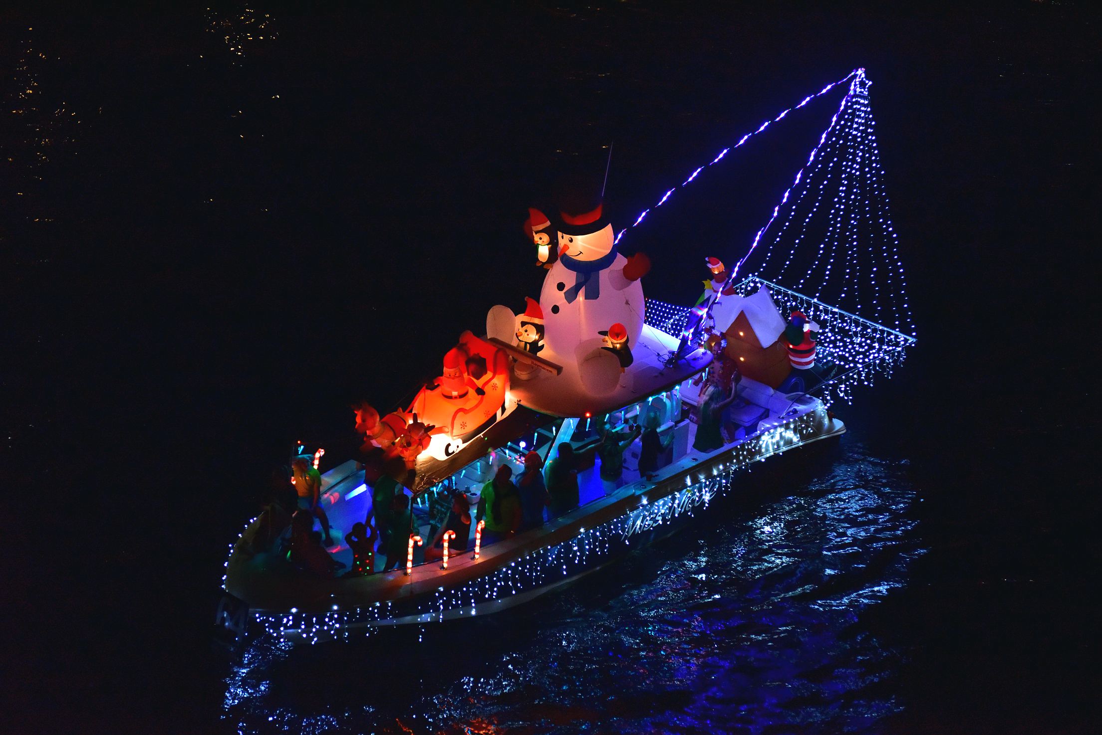 Miss Nicole, boat number 64 in the 2021 Winterfest Boat Parade