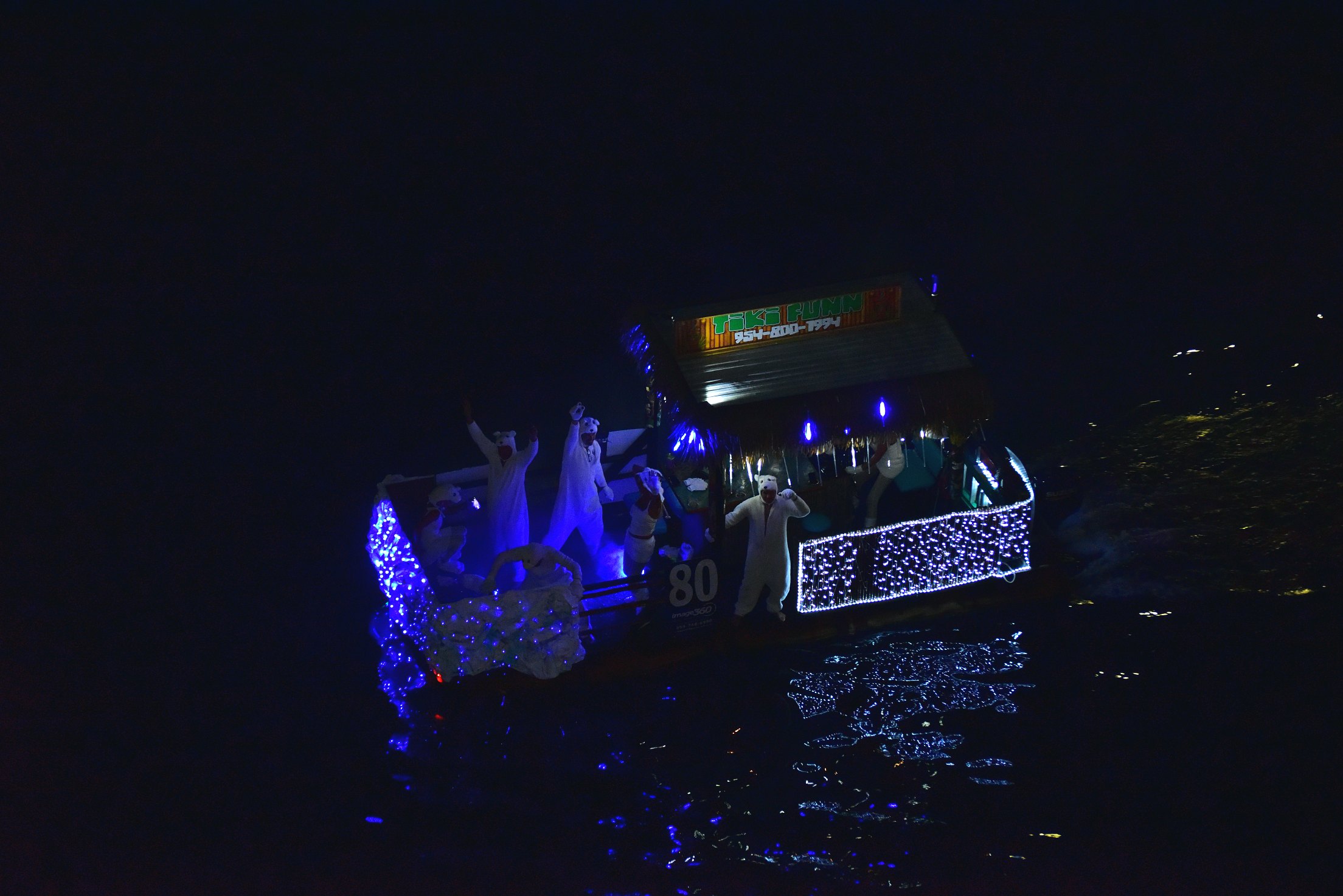 Love Shack, boat number 80 in the 2021 Winterfest Boat Parade