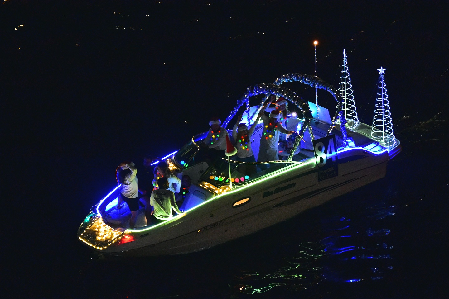 Miss Adventure, boat number 84 in the 2021 Winterfest Boat Parade