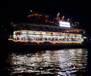 West Marine Brings Santa on board Jungle Queen, boat number 100 in the 2021 Winterfest Boat Parade