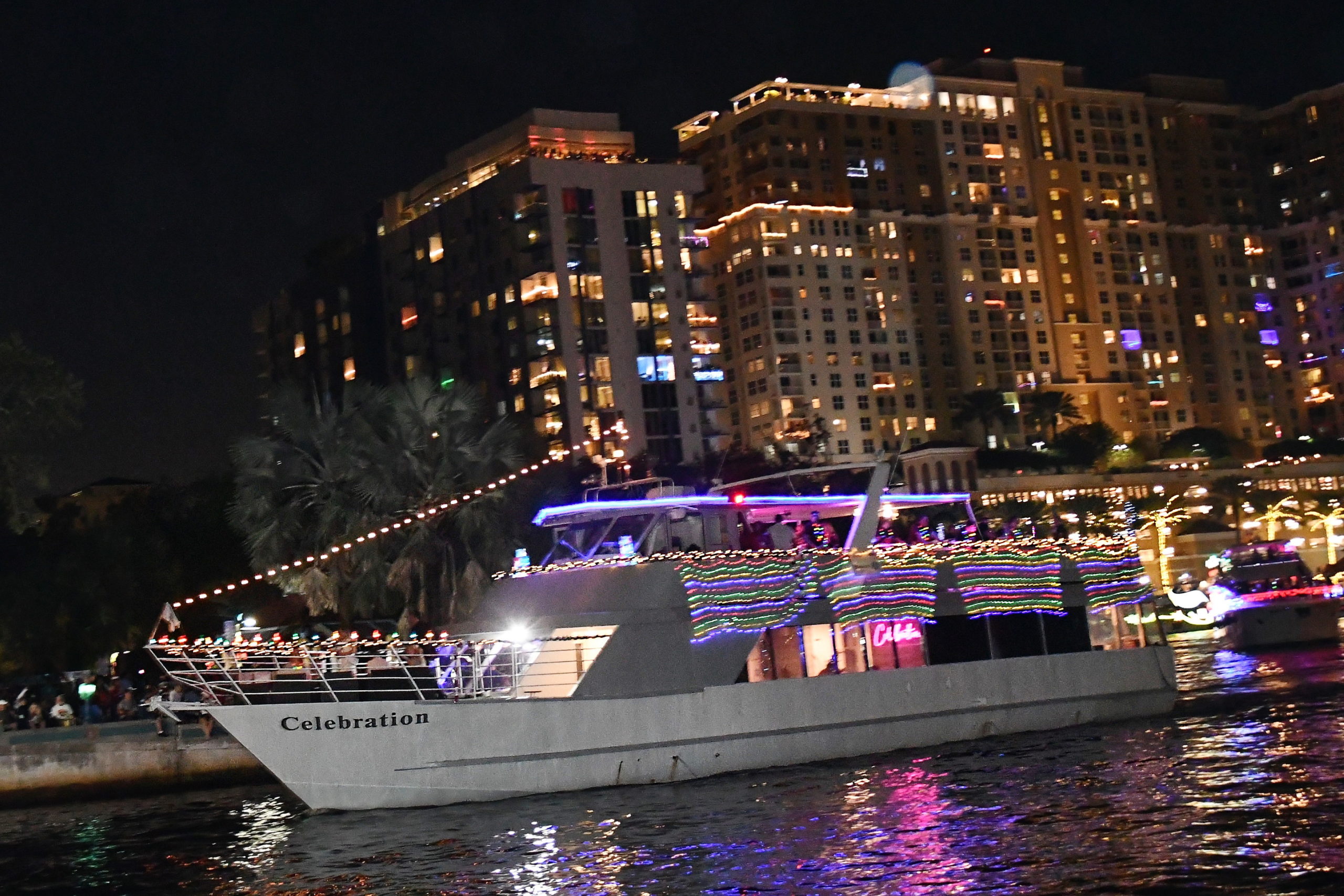 Insight, HP, Intel And Microsoft aboard Celebration, boat number 22 in the 2022 Winterfest Boat Parade
