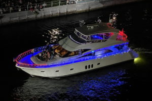Coastal Yacht Charters, boat number 23 in the 2022 Winterfest Boat Parade
