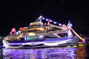 Coral Ridge Yacht Club Aboard Freedom, boat number 46 in the 2022 Winterfest Boat Parade