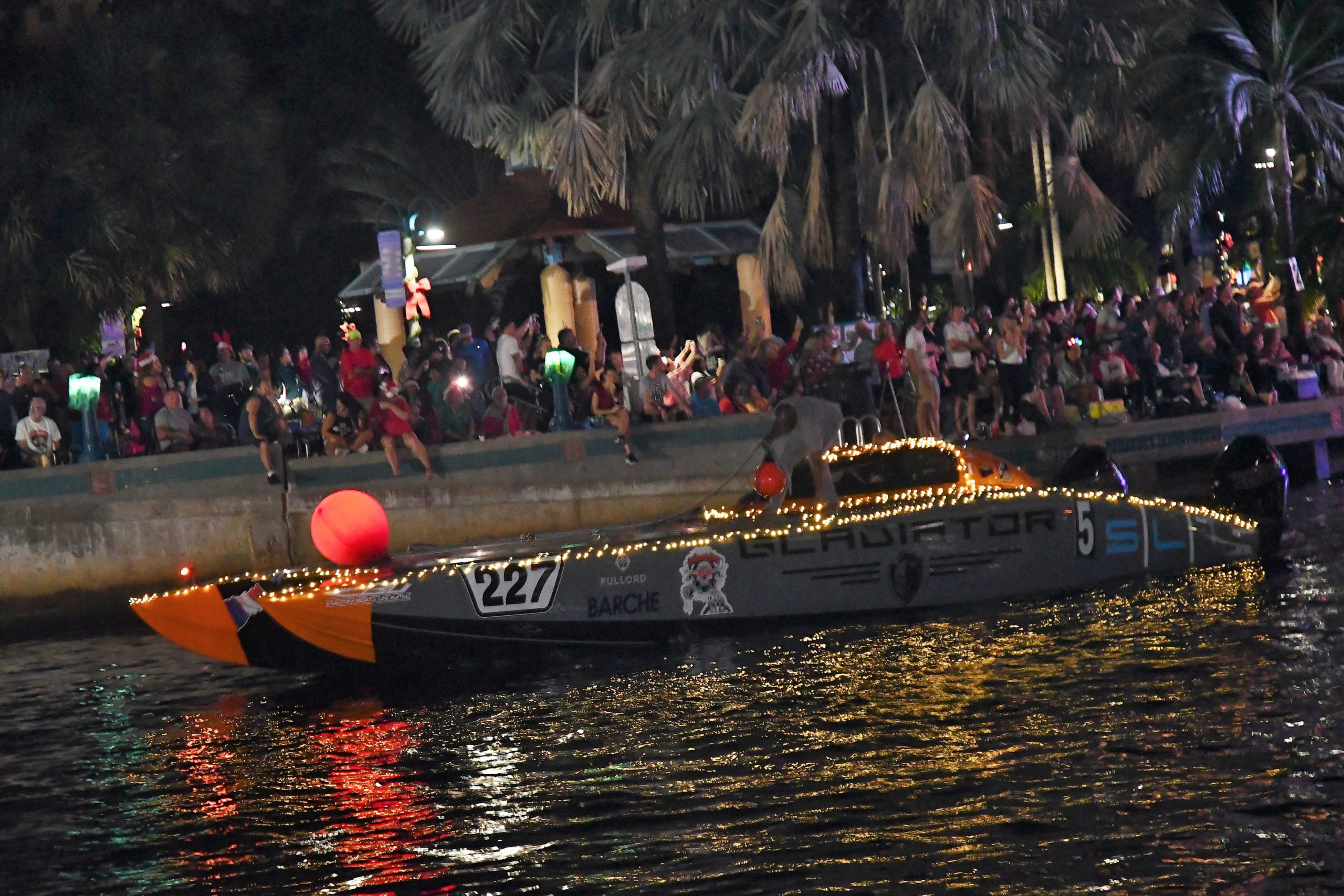 Red Nose Rudolph - Speed Boat Canados, boat number 5 in the 2022 Winterfest Boat Parade