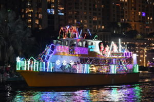 Hip Hop Kidz Neon Nutcracker aboard Water Taxi Fiesta, boat number 57 in the 2022 Winterfest Boat Parade