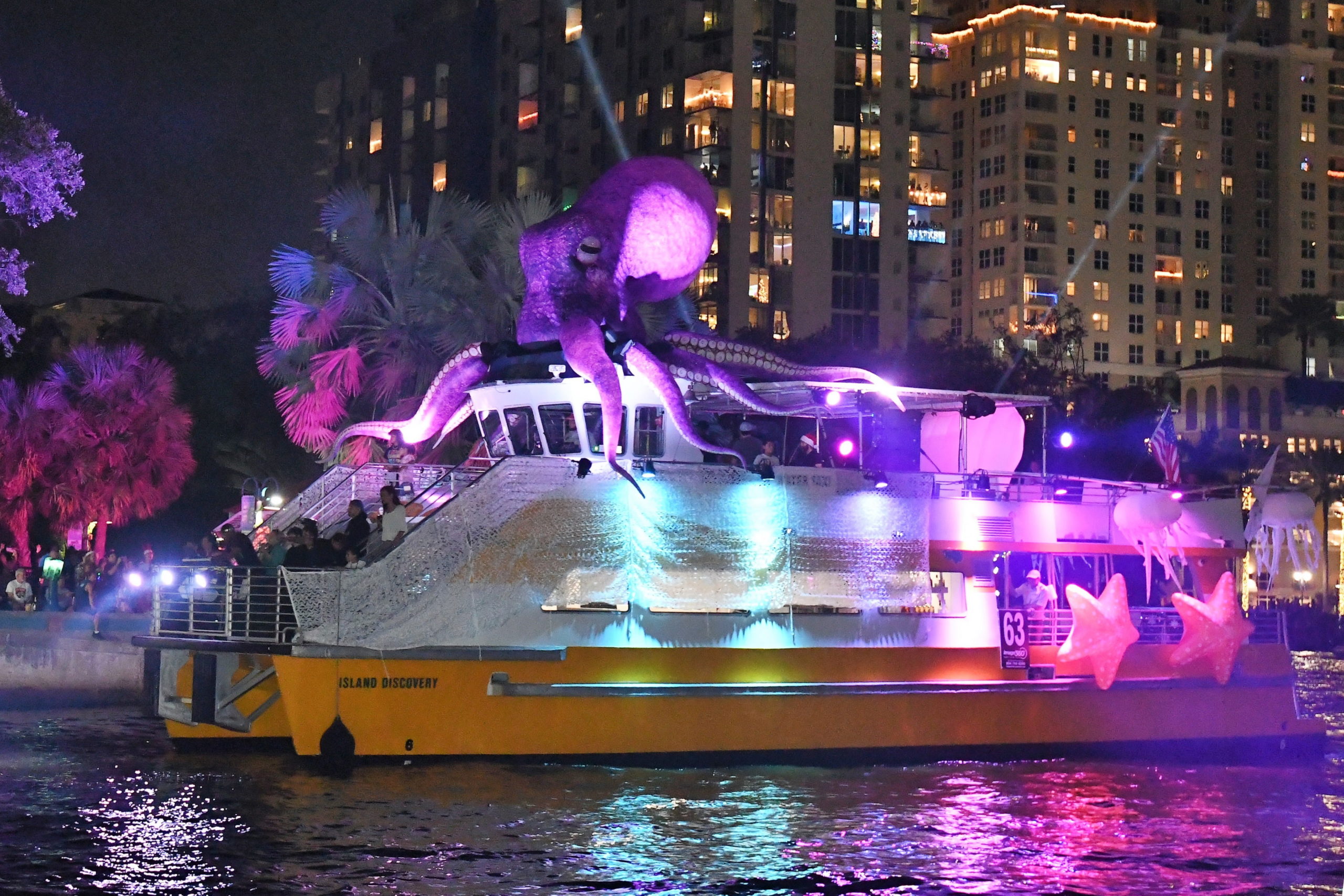 Water Taxi Island Discovery with Winterfest Octopus, boat number 63 in the 2022 Winterfest Boat Parade