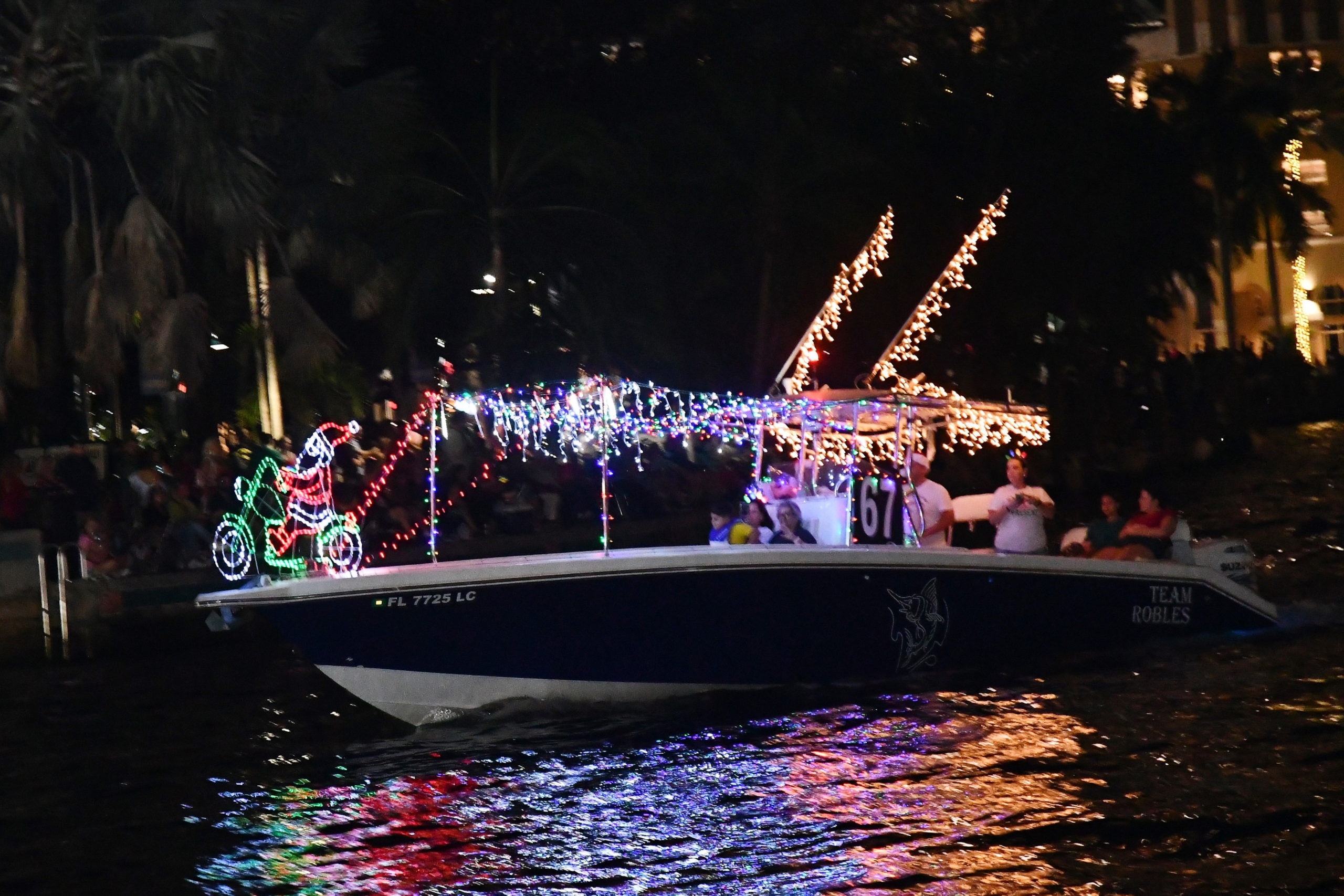 Team Robles, boat number 67 in the 2022 Winterfest Boat Parade
