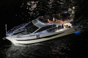 Admeral B, boat number 71 in the 2022 Winterfest Boat Parade