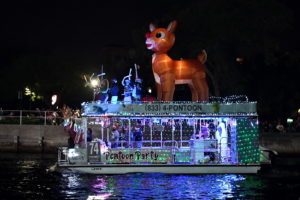 Miss Pontoon, boat number 74 in the 2022 Winterfest Boat Parade