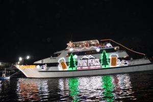 Twin Peaks aboard Sun Dream, boat number 9 in the 2022 Winterfest Boat Parade