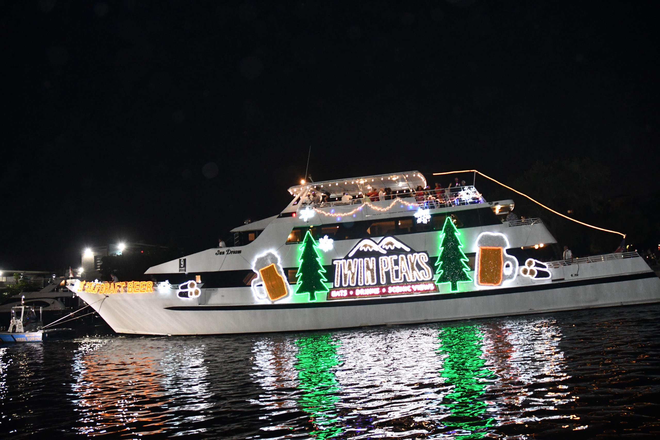 Sun Dream, boat number 9 in the 2022 Winterfest Boat Parade