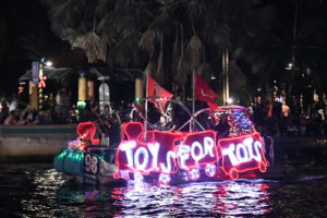 Toys for Tots 75th Anniversary, boat number 98 in the 2022 Winterfest Boat Parade